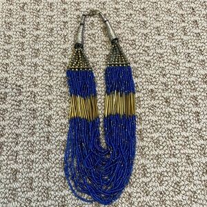 Blue and gold beaded necklace